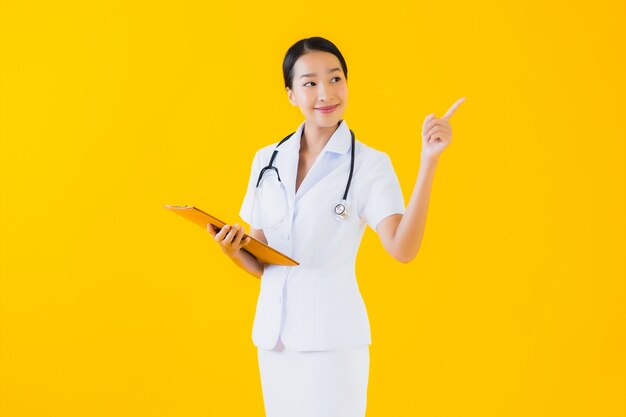 Portrait beautiful young asian woman thai nurse smile happy ready for work for patient