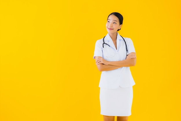 Portrait beautiful young asian woman thai nurse smile happy ready for work for patient