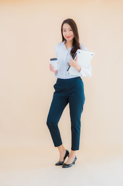 Portrait beautiful young asian woman with computer laptop for work