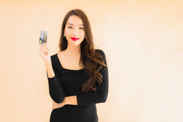 Portrait beautiful young asian woman with credit card