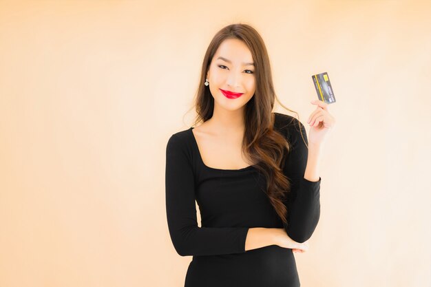 Portrait beautiful young asian woman with credit card