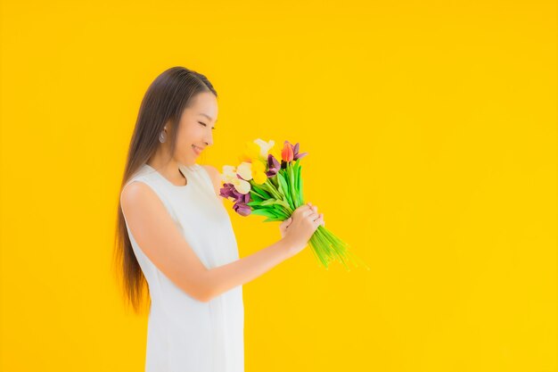 Portrait beautiful young asian woman with flower