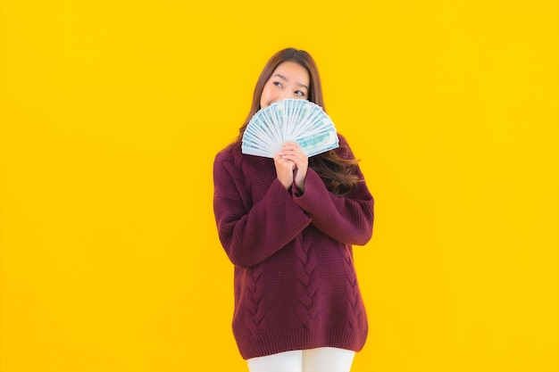 Portrait beautiful young asian woman with a lot of cash and money