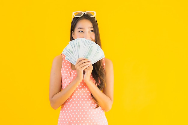 Portrait beautiful young asian woman with a lot of cash