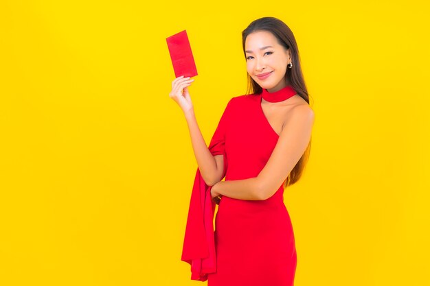 Portrait beautiful young asian woman with Red envelope letter