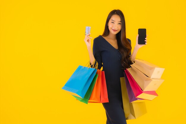 Portrait beautiful young asian woman with shopping bag