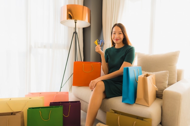 Portrait beautiful young asian women using credit card for online shopping