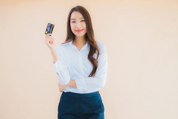 Portrait beautiful young business asian woman with credit card