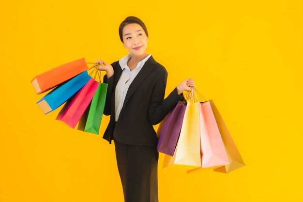 Portrait beautiful young business asian woman with shopping bag