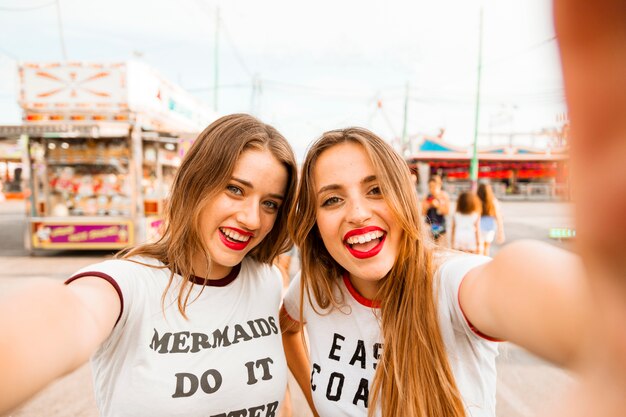 Portrait of beautiful young female friends