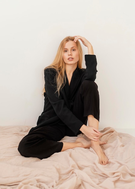 Portrait of beautiful young female wearing formal suit