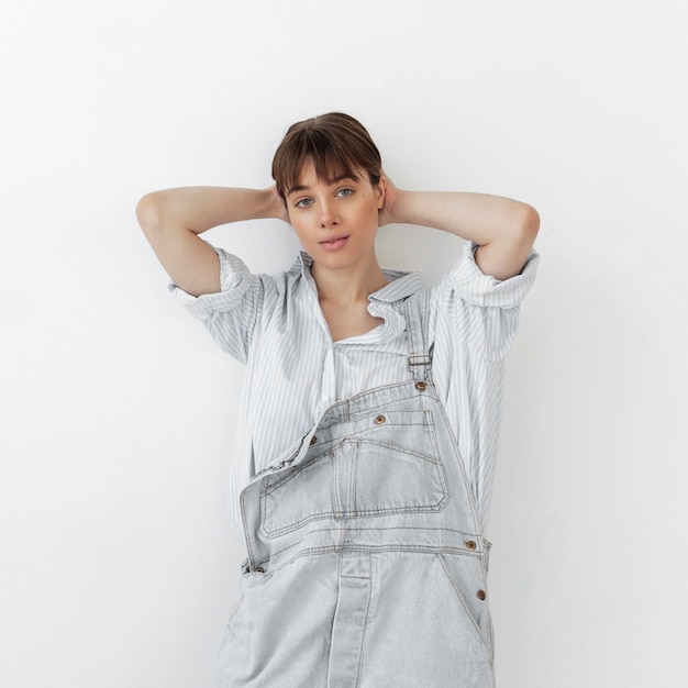 Portrait of beautiful young female wearing jumpsuit