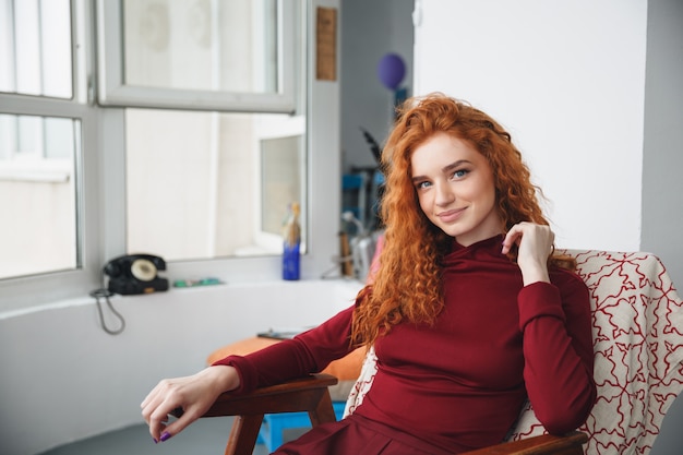 Free photo portrait of a beautiful young redheaded woman