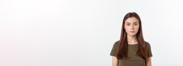 Portrait of a beautiful young woman looking at the camera and smiling isolated on a white background