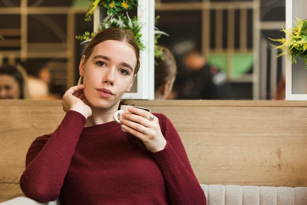 Portrait of beautiful young woman posing