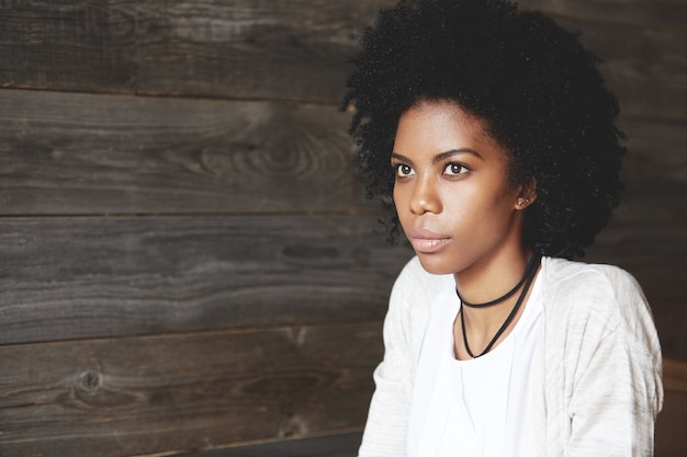 Portrait of beautiful young woman with Afro hairstyle