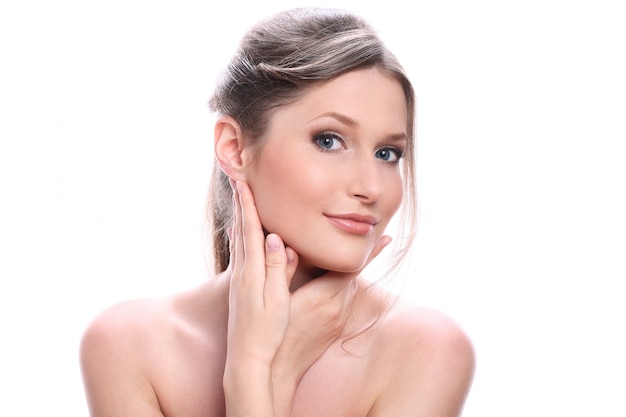 Portrait of beautiful young woman with clean face