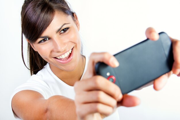 Portrait of beautiful young woman with mobile.