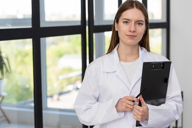 Portrait of blogger holding clipboard