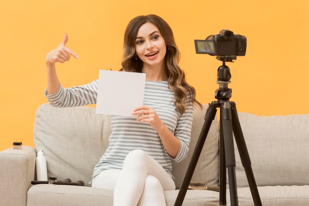 Free photo portrait of blogger recording video