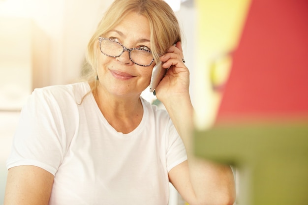 Portrait of blonde elderly woman