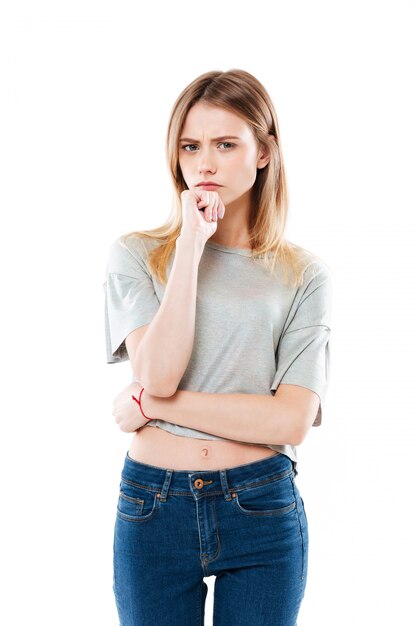 Portrait of a blonde woman thinking and looking