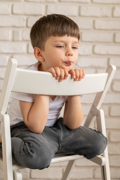 Portrait boy on chair