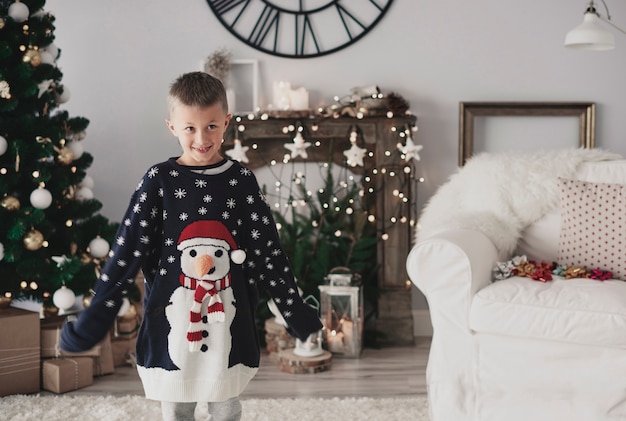 Portrait of a boy wearing oversized a jumper