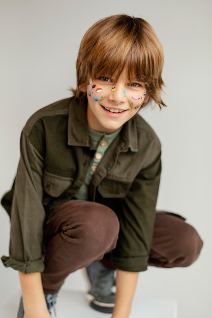 Portrait boy with face painted