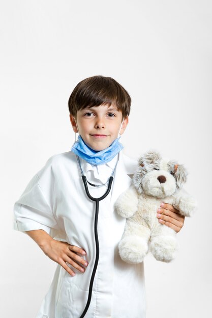 Portrait of boy with teddy bear