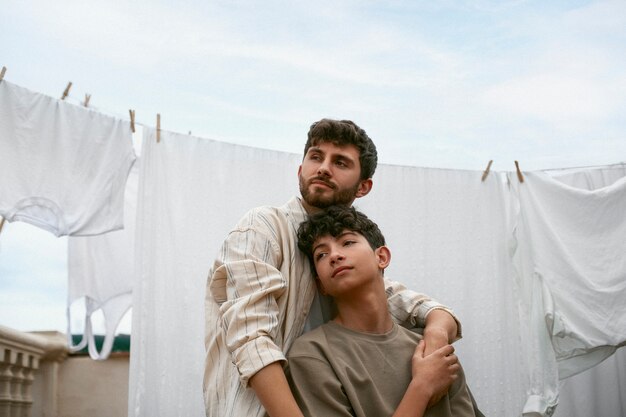 Portrait of brothers spending time together outdoors