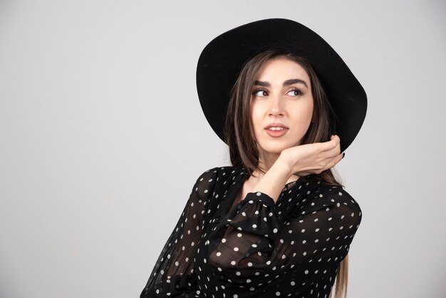 Portrait of brunette woman looking at somewhere.