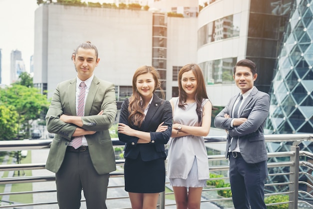 Free photo portrait of business people worker team outside.