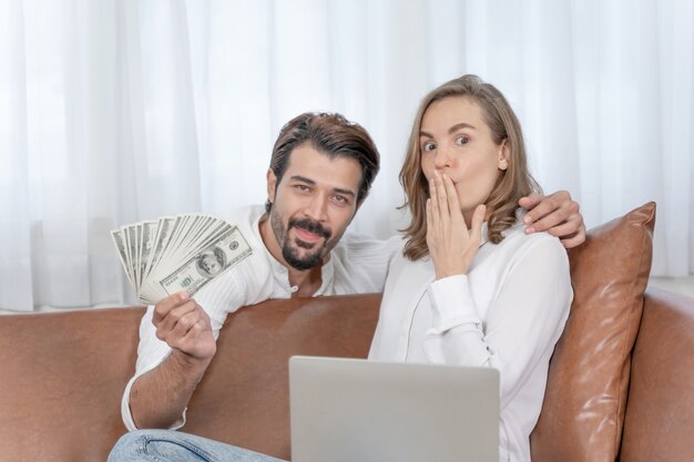 Portrait  businessman and  business woman using the computer laptop at home office