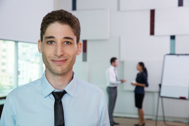 Free photo portrait of businessman in office 3