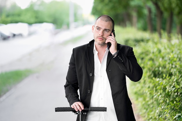 Portrait of businessman talking on the phone