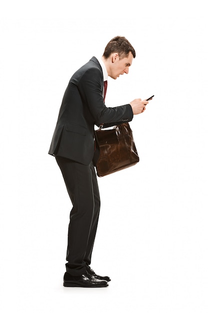 Free photo portrait of businessman with briefcase on white