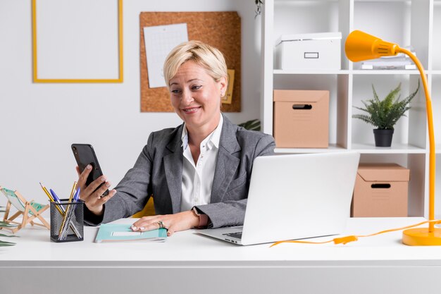 Portrait of businesswoman at desk