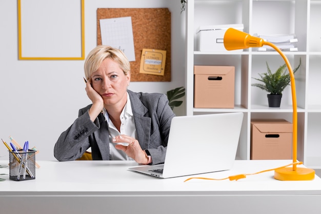 Portrait of businesswoman at desk