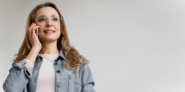 Portrait of businesswoman talking on the phone with copy space