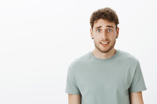 Portrait of a casual guy posing in the studio