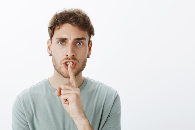 Portrait of a casual guy posing in the studio