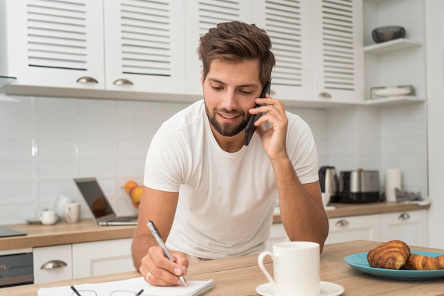 Portrait of casual male working from home