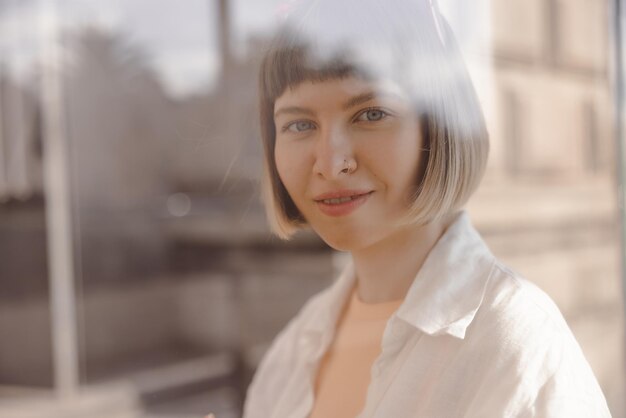 Portrait of charming woman looking at camera