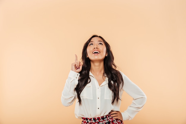 Portrait of a cheerful asian woman