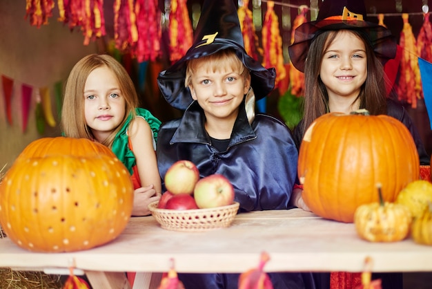 Portrait of cheerful children in the shed