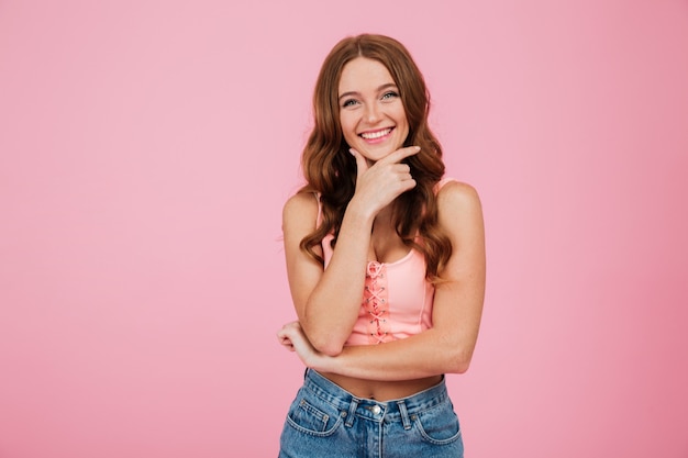 Portrait of a cheerful happy woman in summer clothes