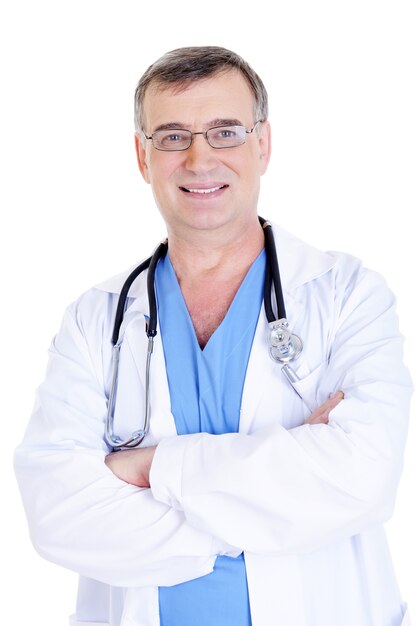 Portrait of cheerful successful male doctor with stethoscope and in hospital gown