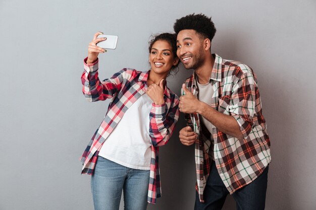 Portrait of a cheerful young african couple