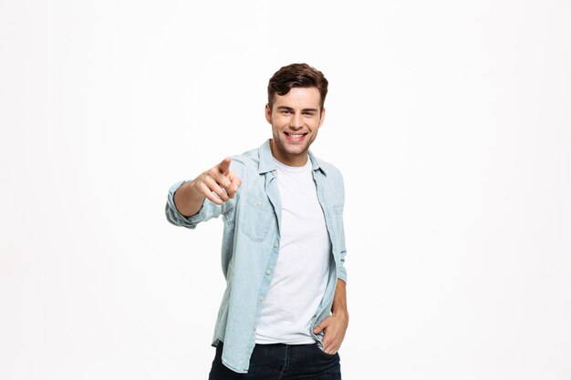 Portrait of a cheerful young man standing